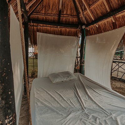 Cama hamaca de la cabaña La Guadalupana en Ecohotel Del Toro Arboletes